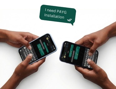 Hands exchanging trade-in Legacy Systems with Silicon cover, stickers on back exterior, for new Bulk Energy Supply in the box.